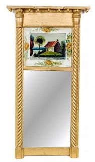 * An American Giltwood and Eglomise Decorated Mirror Height 30 1/2 x width 16 inches.