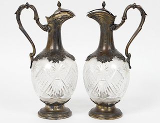 PAIR OF CUT GLASS AND SILVER PLATED MOUNTED DECANTERS