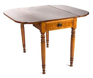 An American Maple Drop-Leaf Table Height 29 x width 35 1/2 x depth 22 inches.