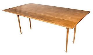 A Shaker Sycamore Drop-Leaf Table Height 30 x width 72 x depth 21 inches.