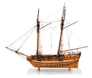 A Two-Masted Wood Model of a Ship Height 30 inches.