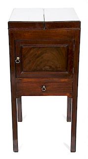 A George III Style Mahogany Wash Stand Height 33 1/2 x width 15 1/2 x depth 15 3/4 inches.