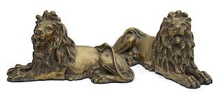 A Pair of English Brass Recumbent Lion Desk Ornaments Length 10 inches.