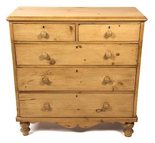 An English Pine Chest of Drawers Height 41 1/4 x width 41 3/4 x depth 18 1/4 inches.