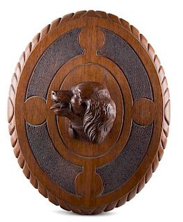 A Black Forest Carved Oak Plaque Height 19 1/2 inches.