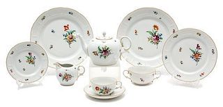A Nymphenburg Porcelain Partial Dinner Service Diameter of first 10 3/8 inches.