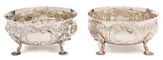 A Pair of Victorian Silver Bowls, Daniel & Charles Houle, London, 1880, each chased with flower heads and C-scrolls and raise