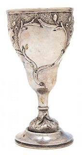 A French Silver Repousse Goblet, , having oak leaf decoration with an open cartouche.