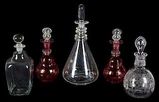 A Group of Five Glass Decanters Height of tallest 13 1/2 inches.