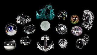 A Collection of Fifteen Glass Paperweights Height of tallest 5 inches.
