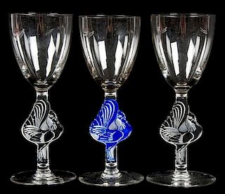 A Set of Three Lalique Molded and Frosted Glass Cordials Height 6 inches.