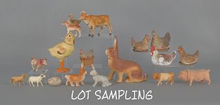 Eleven composition candy containers, late 19th/ear