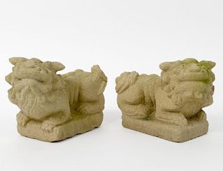 PAIR OF CARVED SANDSTONE FU-DOGS