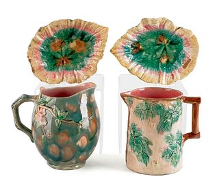 Two Etruscan majolica pitchers, 8" h. and 7 1/4" h