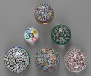 Six millefiori glass paperweights, to include twou