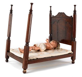Victorian walnut doll bed, 19th c., 20 1/2" h., 15