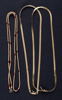 Three 14K yellow gold necklaces, to include two he
