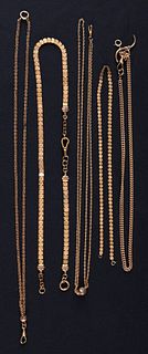 Five chains, to include a 14K yellow gold watch ch