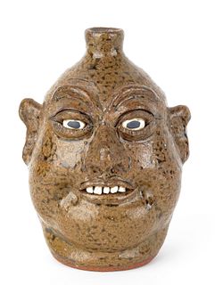 Georgia stoneware face jug by Lanier Meaders, sign