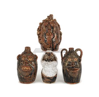 Four Georgia stoneware face jugs by Marie Rogers,l