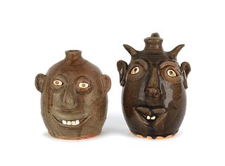 Two Georgia stoneware face jugs by David and Reggi