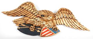 Carved and gilded eagle plaque, ca. 1940, 43" w.