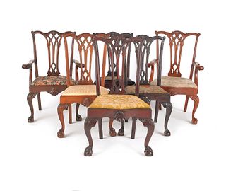 Six Chippendale style dining chairs.
