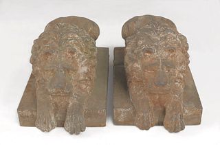 Pair of cast iron recumbent lion lawn ornaments, 1