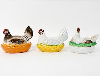 THREE EARTHENWARE HENS ON A NEST DISHES