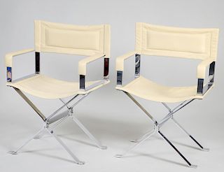 TWO LEATHER AND CHROMED STEEL ARMCHAIRS