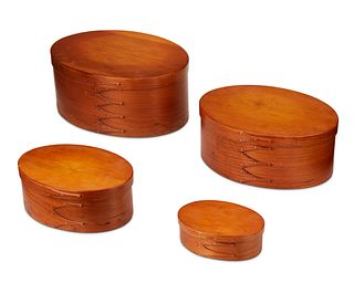 A set of oval Shaker-style bentwood nesting boxes