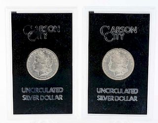 Lot of 2: Carson City Silver Dollars.
