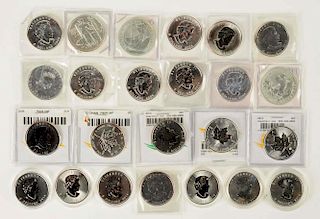 Lot Of 24: Canadian Silver Dollars.