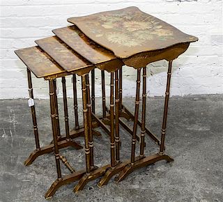 * A Set of Painted Nesting Tables. Height of tallest 28 inches.