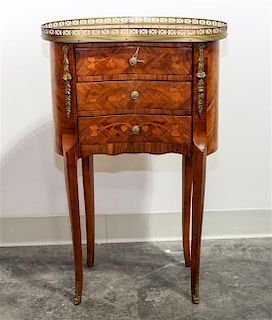 A Louis XV Style Marquetry Table en Chiffonier Height 29 1/4 x width 19 x depth 10 3/4 inches.