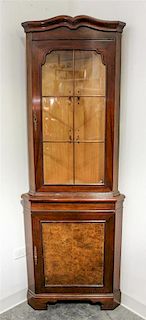 A Georgian Style Mahogany Corner Cabinet Height 73 inches.