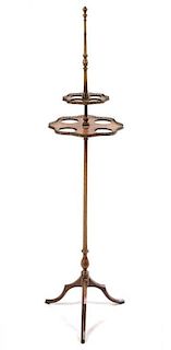A Tripod Serving Stand. Height 57 1/4 inches.