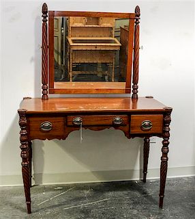 * An American Classical Mahogany Vanity Height 59 x width 42 1/4 x depth 19 1/2 inches.