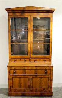 An American Empire Secretary Bookcase Height 90 1/2 x width 41 1/2 x depth 22 inches.