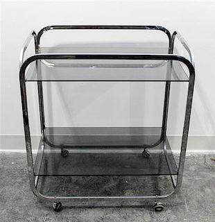 An Aluminum and Smoked Glass Bar Cart Height 27 3/4 x width 25 x depth 17 inches.
