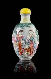 * A Famille Rose Porcelain Snuff Bottle Height 3 1/4 inches.