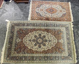 A Tabriz Wool Rug Larger: 7 feet 3 inches x 4 feet 8 inches.
