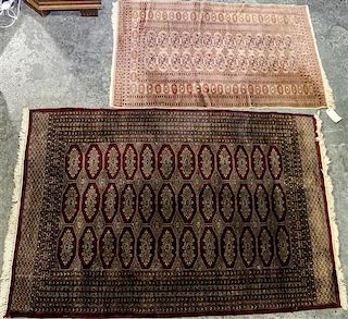 Two Bokhara Wool Rugs Larger: 6 feet 7 inches x 4 feet 5 inches.