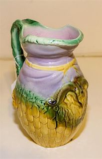 A Majolica Pitcher. Height 8 1/2 inches.