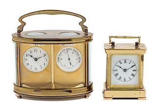 Two French Brass Carriage Clocks Height of first 4 1/2 x width 5 3/4 inches.
