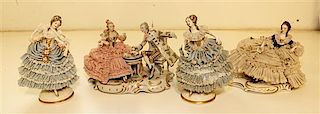 * Four German Porcelain Figures Height of tallest 7 1/2 inches.