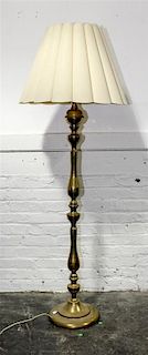 A Brass Floor Lamp. Height 60 inches.