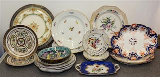 A Group of Porcelain Plates Diameter of largest 12 1/2 inches.