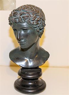 A Neoclassical Style Bust. Height 17 1/2 inches.