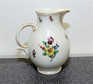 A Nymphenburg Porcelain Creamer. Height of creamer 5 inches.